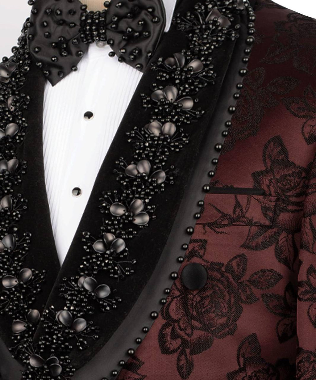 Black beaded tuxedo with a white shirt and black bow tie, featuring intricate detailing.