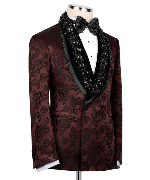 Elegant maroon floral tuxedo with black lapels on a mannequin against a white background