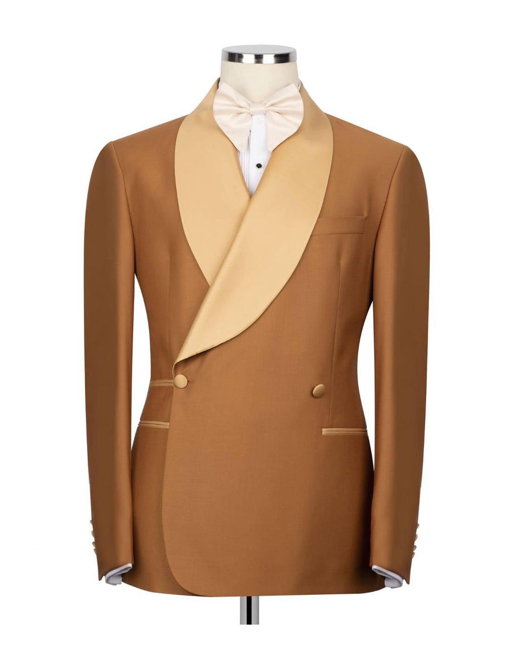 A men's double-breasted tuxedo jacket in camel brown with a contrasting light beige shawl collar, displayed on a mannequin torso with a matching bow tie and white shirt.