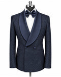 A men's double-breasted tuxedo jacket in navy blue textured tweed with a contrasting solid navy satin shawl collar, styled on a mannequin with a white dress shirt and matching navy bow tie against a plain white background.