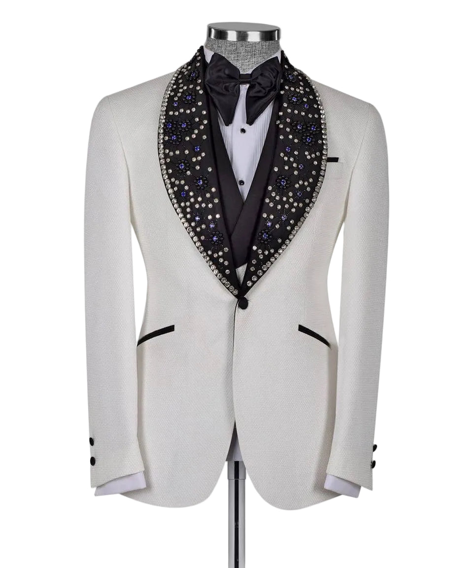 White tuxedo jacket with black lapels and decorative collar on a mannequin against a white background