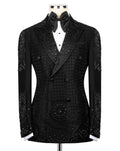 Black tuxedo jacket with intricate detailing on a mannequin against a white background