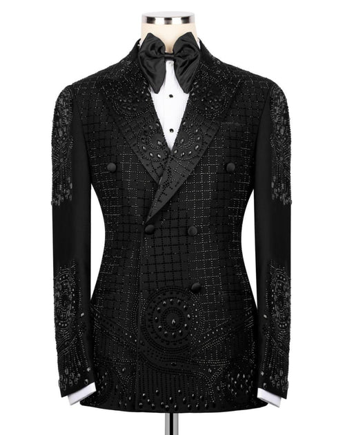 Black tuxedo jacket with intricate detailing on a mannequin against a white background