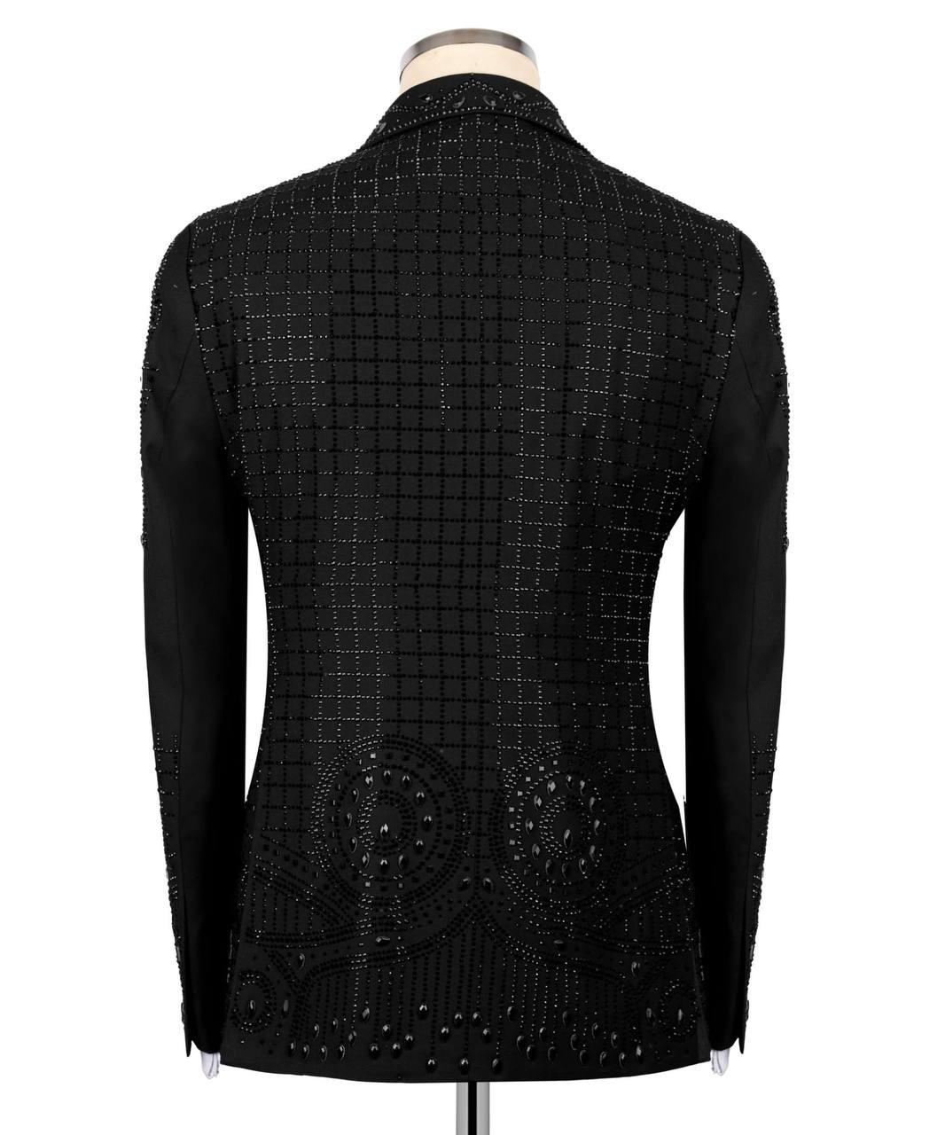 Black textured blazer on a mannequin against a white background