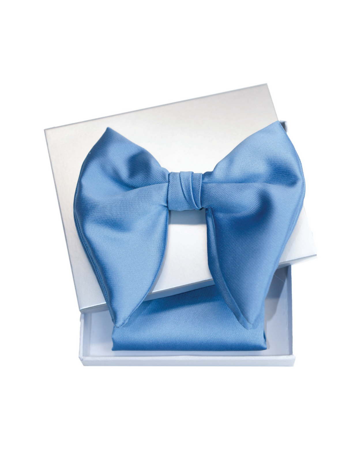 A light blue satin bow tie displayed inside an open white gift box with a matching folded pocket square, on a plain white background.