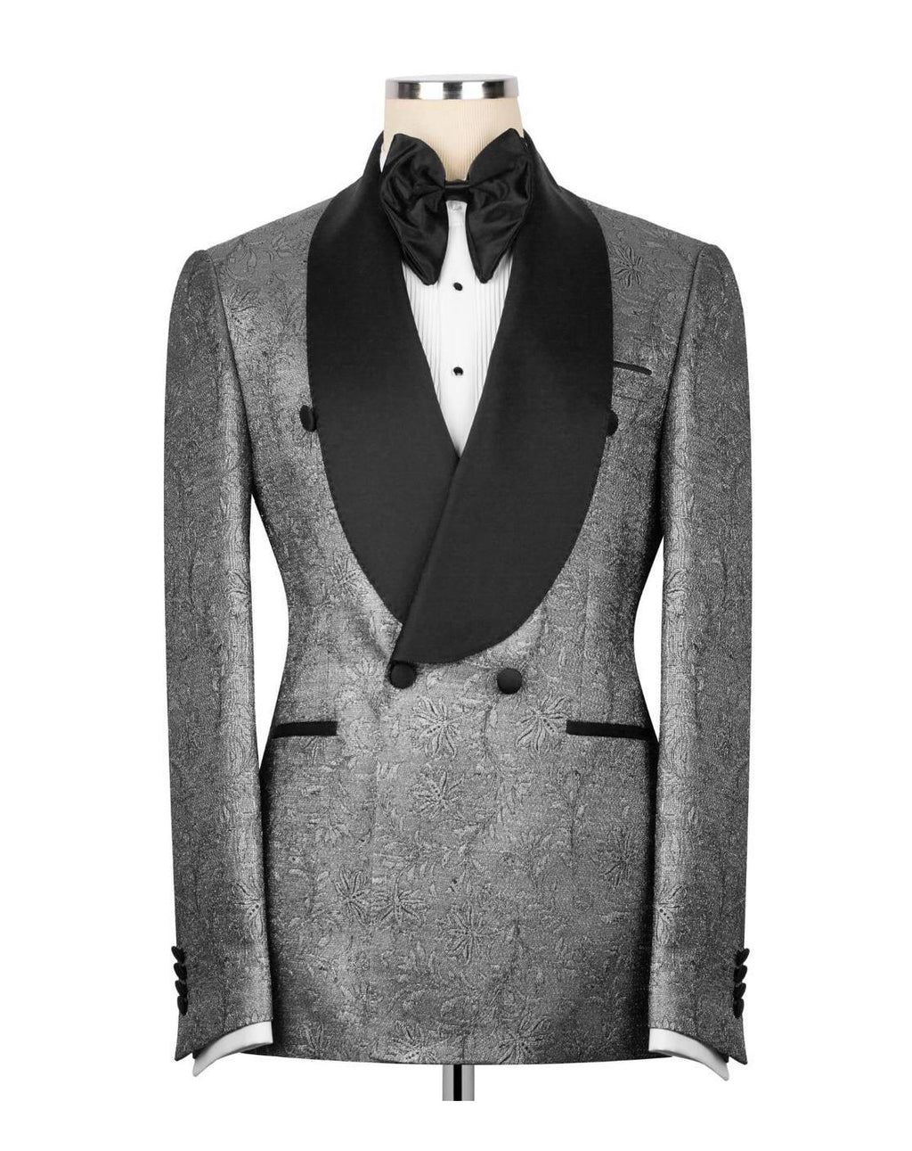 A men's double-breasted tuxedo jacket with a textured silver-gray patterned fabric body and contrasting black satin shawl collar, displayed on a mannequin with a black bow tie and white shirt.