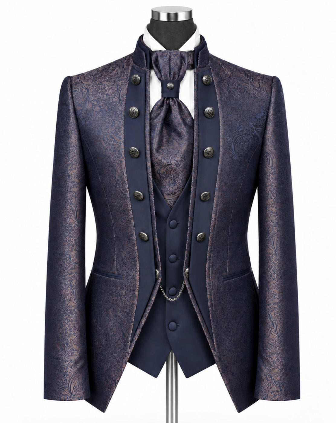 A men's formal tailoring set displayed on a mannequin, featuring a textured navy blue patterned jacket, matching vest, waistcoat, and tie, with a white shirt and dark navy trousers.