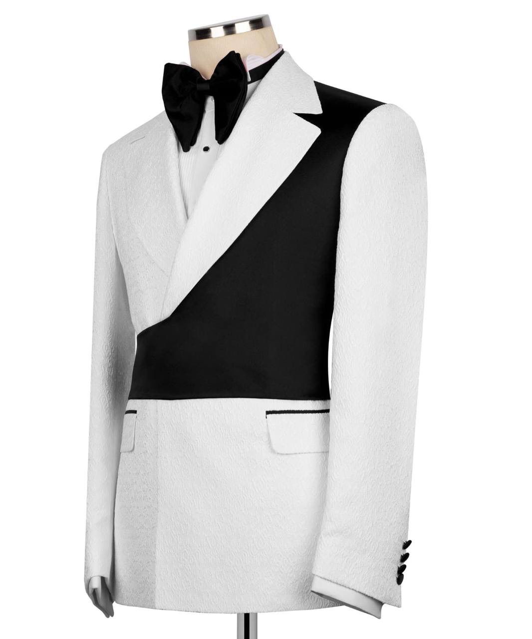 White tuxedo with black lapels and bow tie on a mannequin against a white background