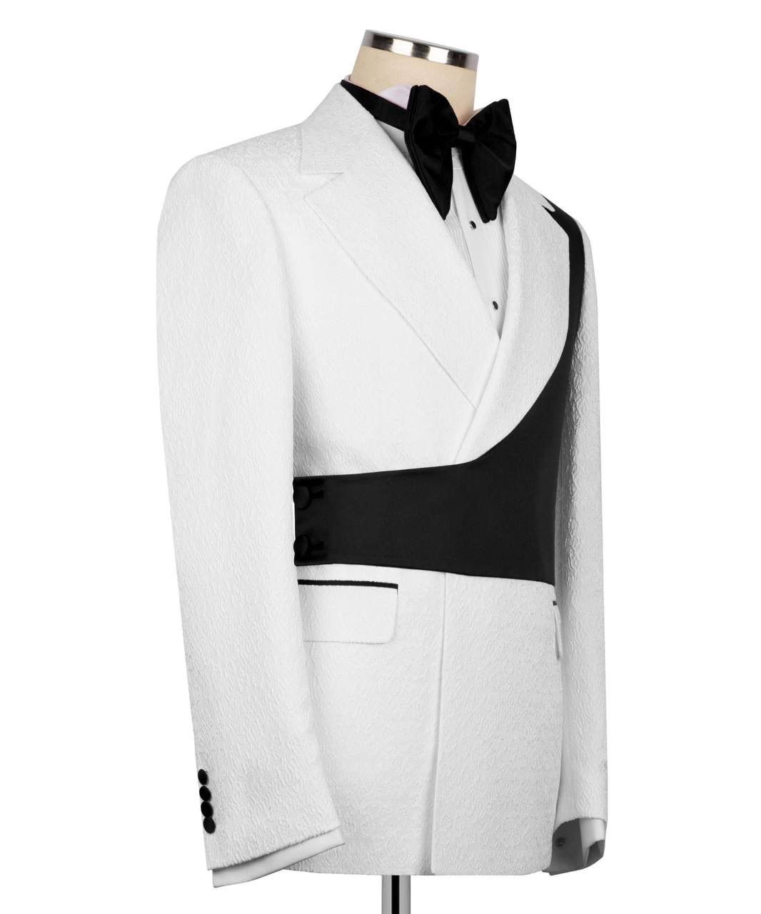 White tuxedo with black lapels and bow tie on a mannequin against a white background