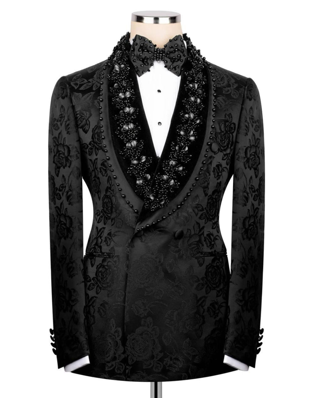 Black embroidered tuxedo jacket on a mannequin against a white background