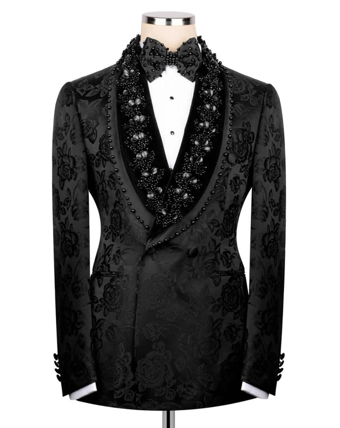 Black embroidered tuxedo jacket on a mannequin against a white background