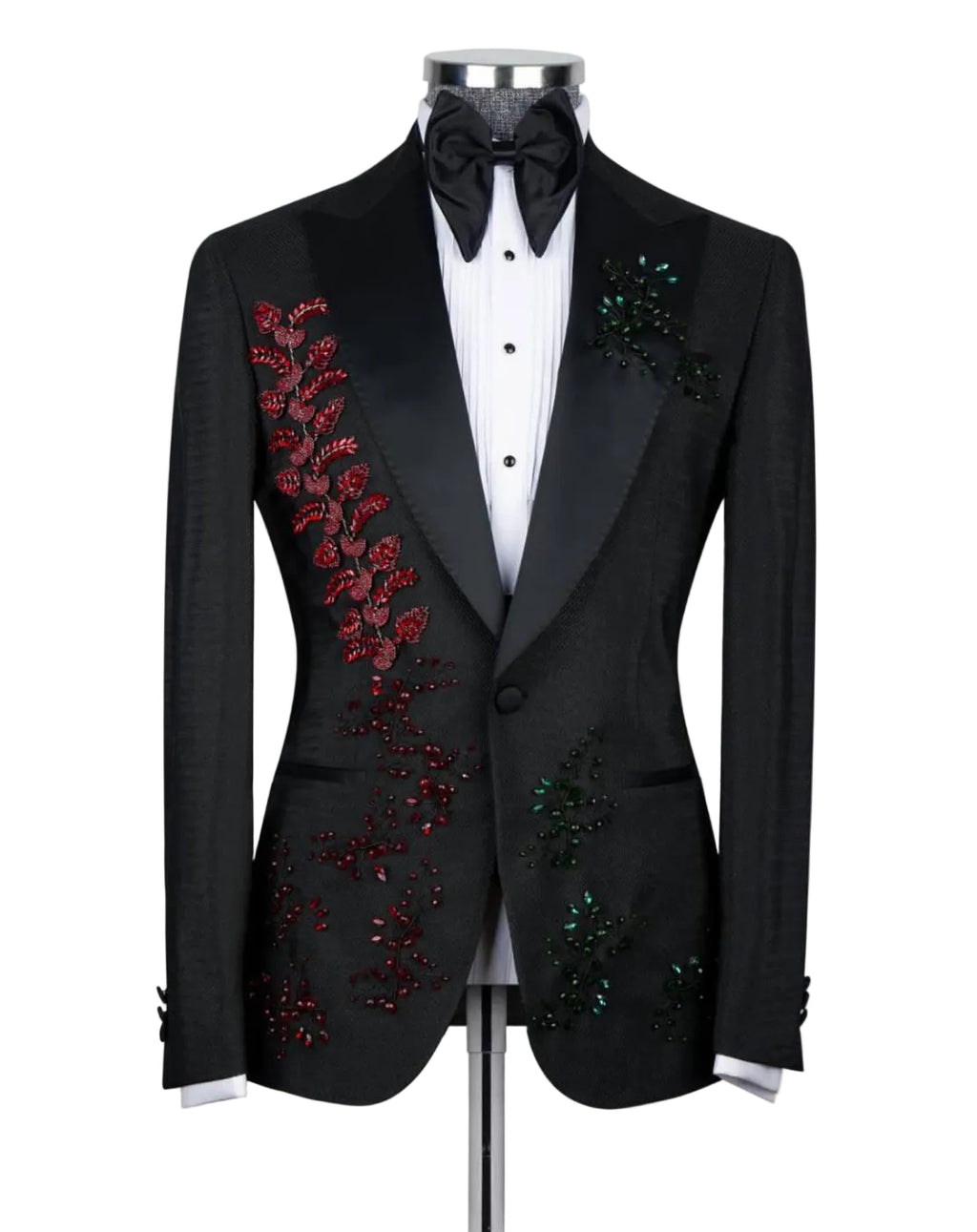 Black embroidered tuxedo jacket on a mannequin with a white shirt and black bow tie.