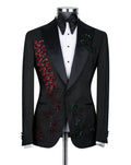 Black embroidered tuxedo jacket on a mannequin with a white shirt and black bow tie.