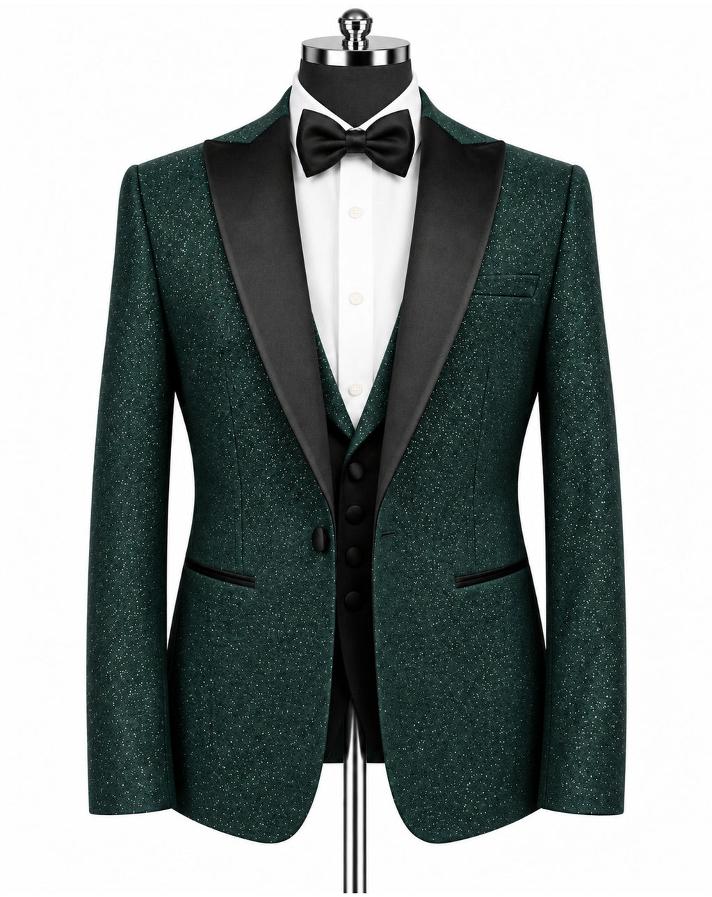 A men's formal tuxedo jacket in dark green textured tweed with black satin shawl lapels, displayed on a black mannequin torso with a white dress shirt, black bow tie, and matching black vest.