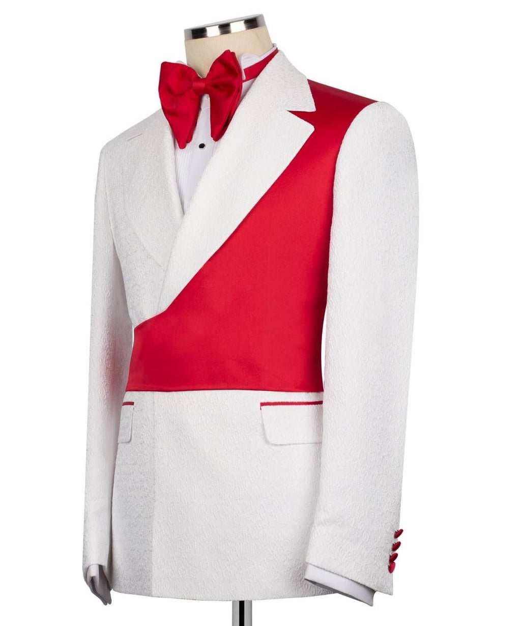 White suit jacket with red vest and bow tie on a mannequin against a white background