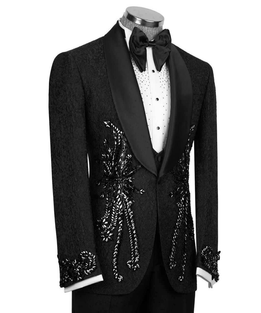 Black tuxedo with intricate detailing on a mannequin against a white background