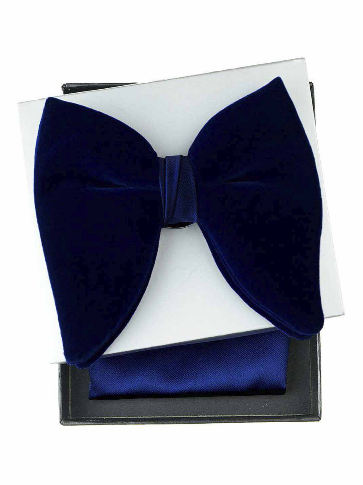 A dark navy blue velvet bow tie presented with a matching navy blue pocket square and a white presentation card inside a black gift box, set against a plain white background.