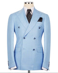 Light blue double-breasted suit jacket on a mannequin with a white background