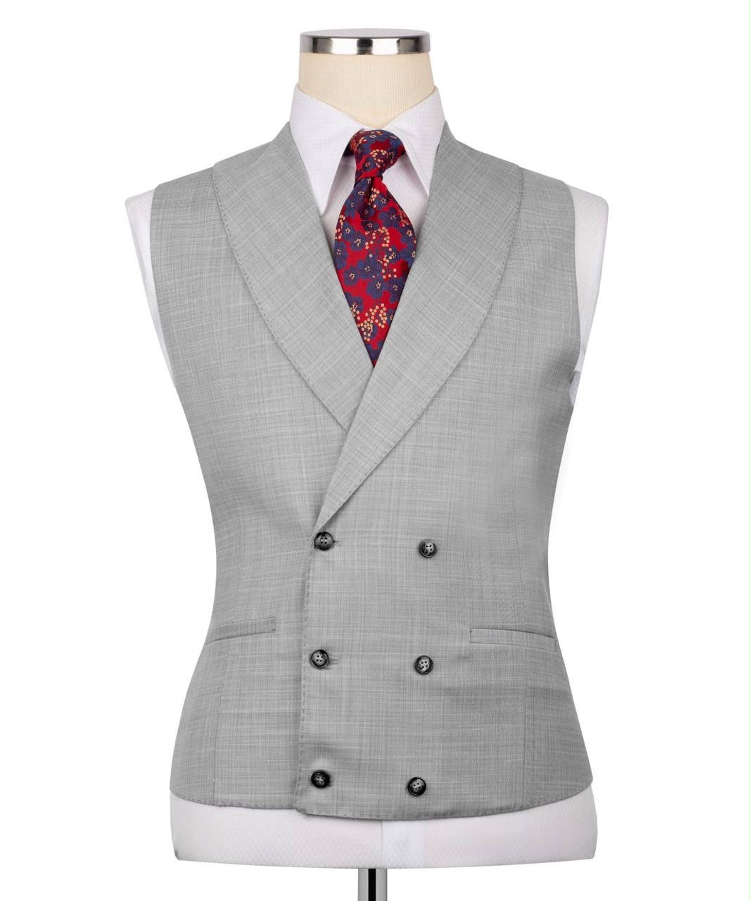 A light gray double-breasted vest displayed on a mannequin torso, styled with a white dress shirt and a red patterned tie against a plain white background.