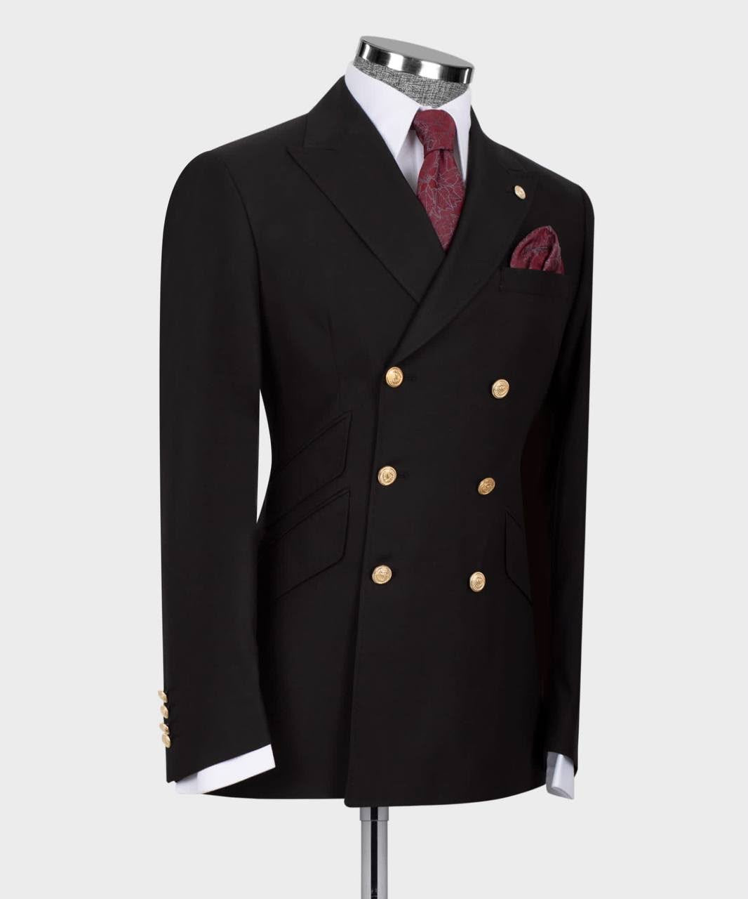 A black double-breasted suit jacket displayed on a mannequin torso, featuring gold buttons, a white dress shirt, a burgundy patterned tie, and a matching pocket square