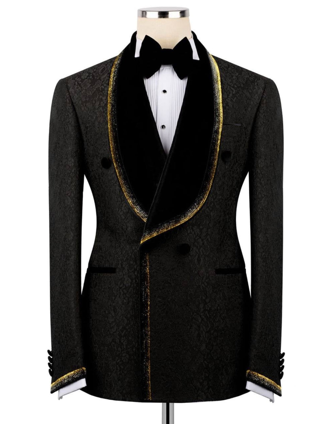 Black tuxedo with gold trim on a mannequin 