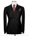 A black double-breasted suit jacket displayed on a mannequin torso, styled with a white dress shirt, a red and black patterned tie, and a matching pocket square against a plain white background.