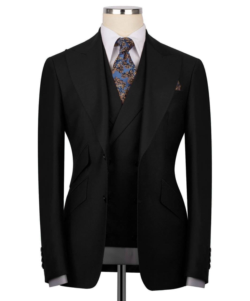 Black suit jacket with a patterned tie on a mannequin