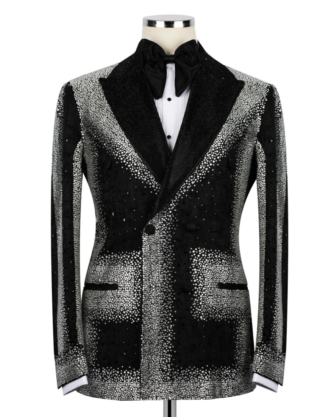 Black tuxedo jacket with silver sequin details on a mannequin against a white background