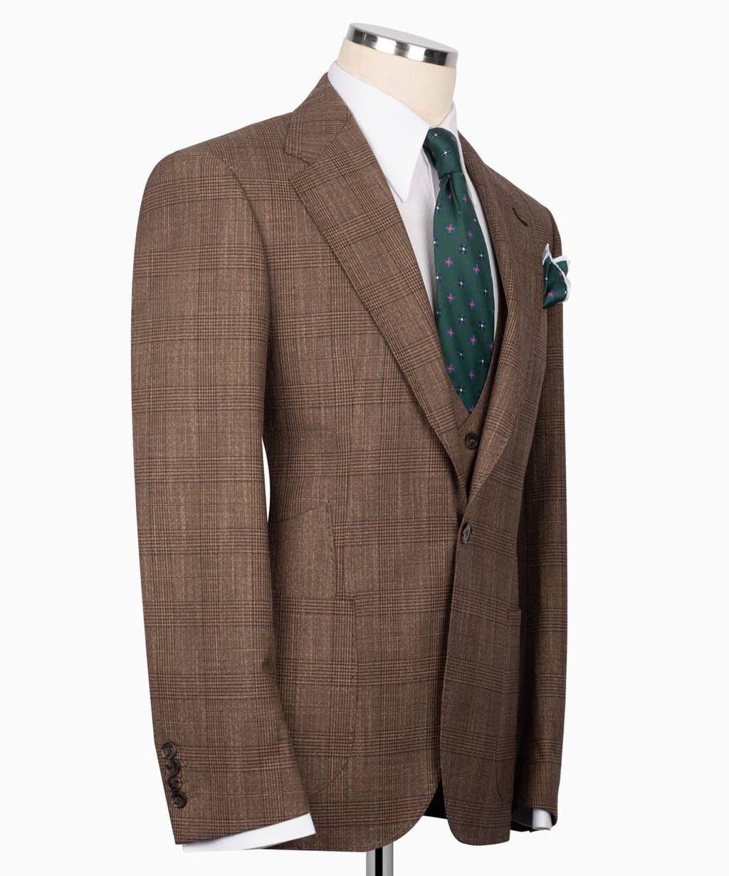 Brown checkered suit jacket on a mannequin 