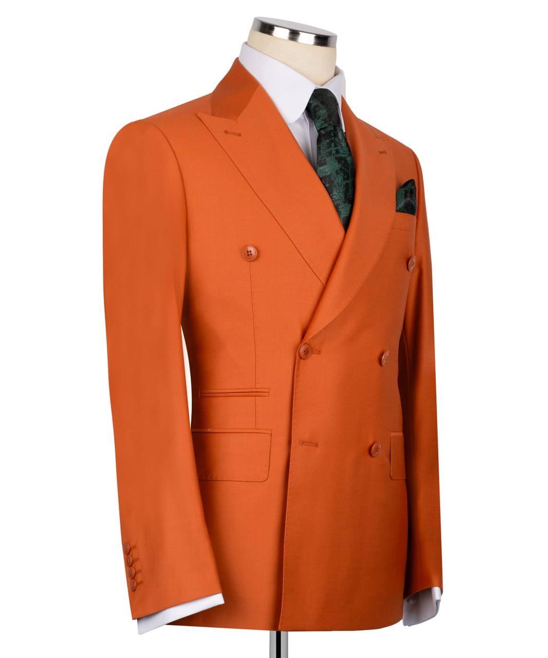 Orange suit jacket on a mannequin with a white background