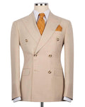 A beige double-breasted suit jacket displayed on a mannequin torso, styled with a white dress shirt, an orange patterned tie, and a matching orange pocket square against a plain white background.