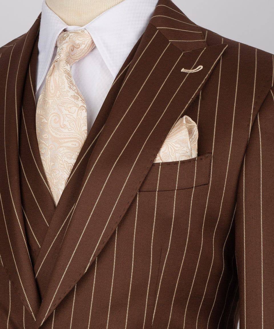 Brown pinstripe suit with a white shirt, beige tie, and pocket square on a mannequin.