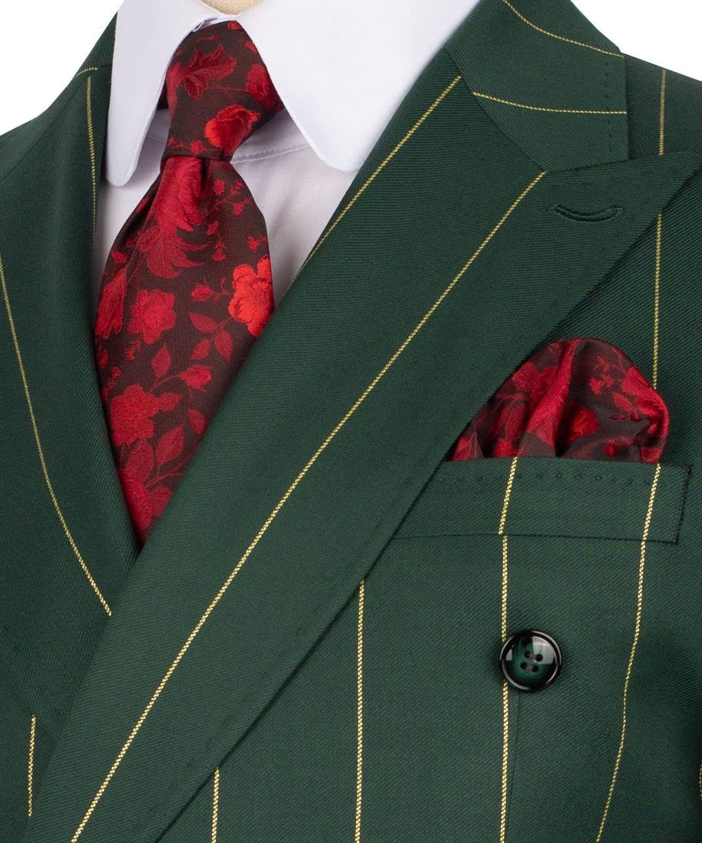 Green suit with red floral tie and pocket square on a white background