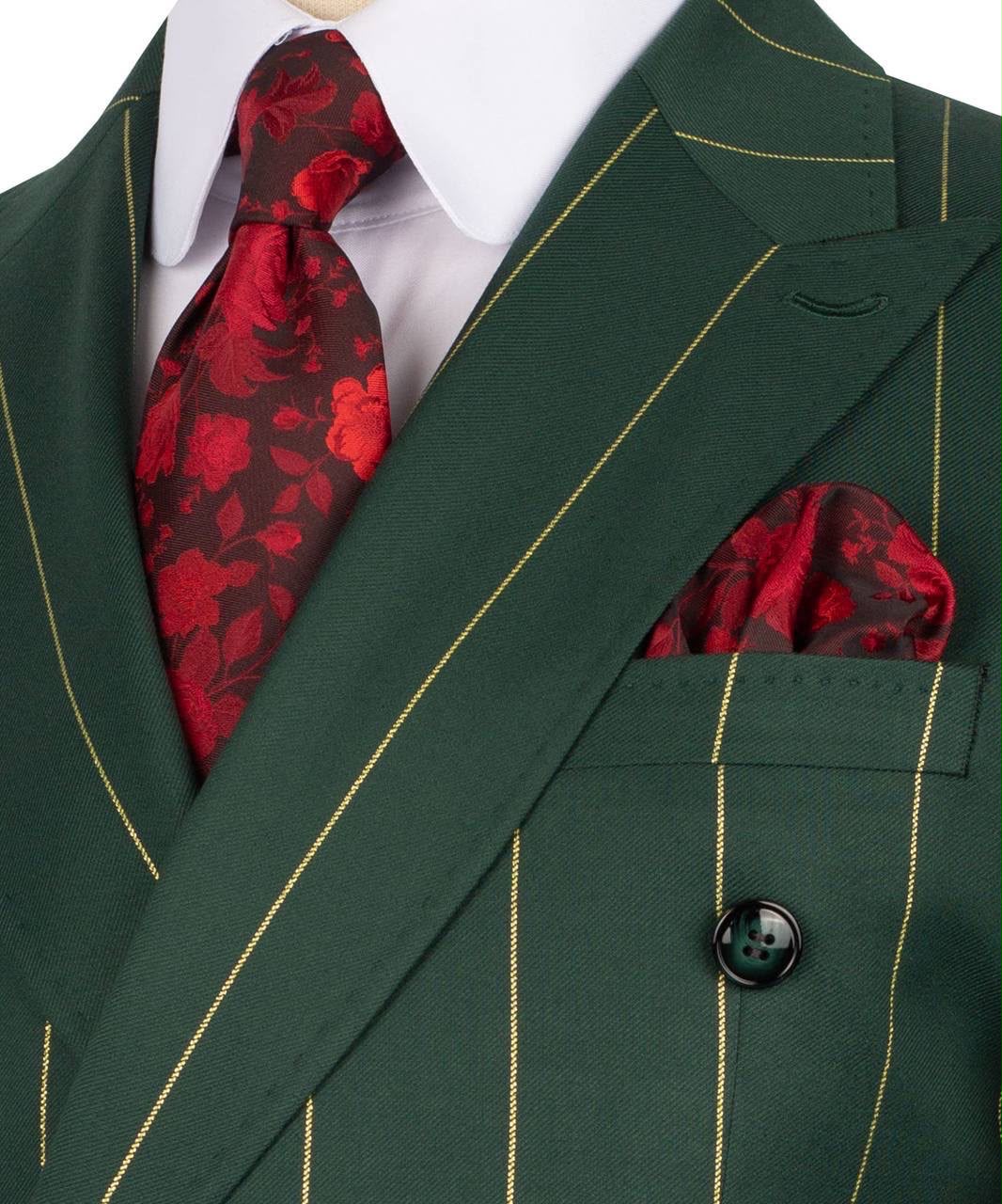Green suit with red floral tie and pocket square on a white background
