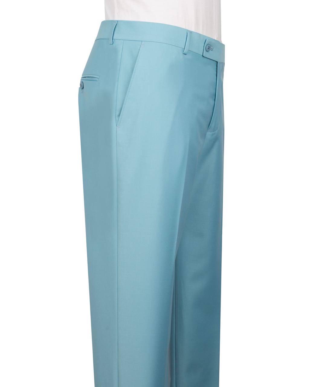 A close-up side view of a pair of light blue dress pants worn with a white shirt, showing the waistband, belt loops, side pocket, and front crease on a plain white background.