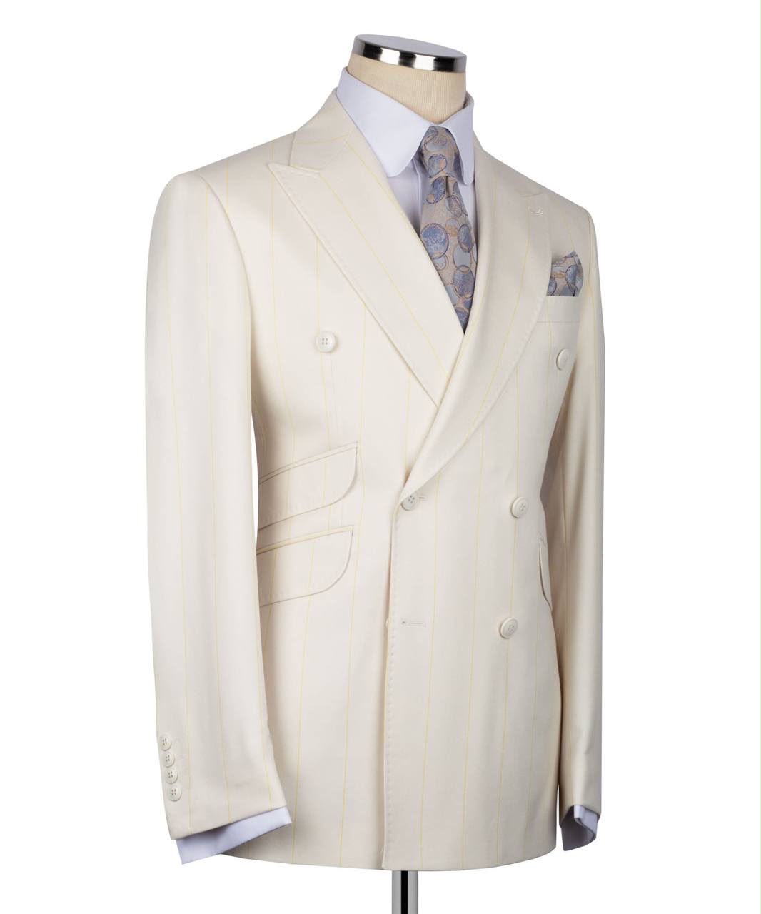 Beige suit jacket on a mannequin with a white background