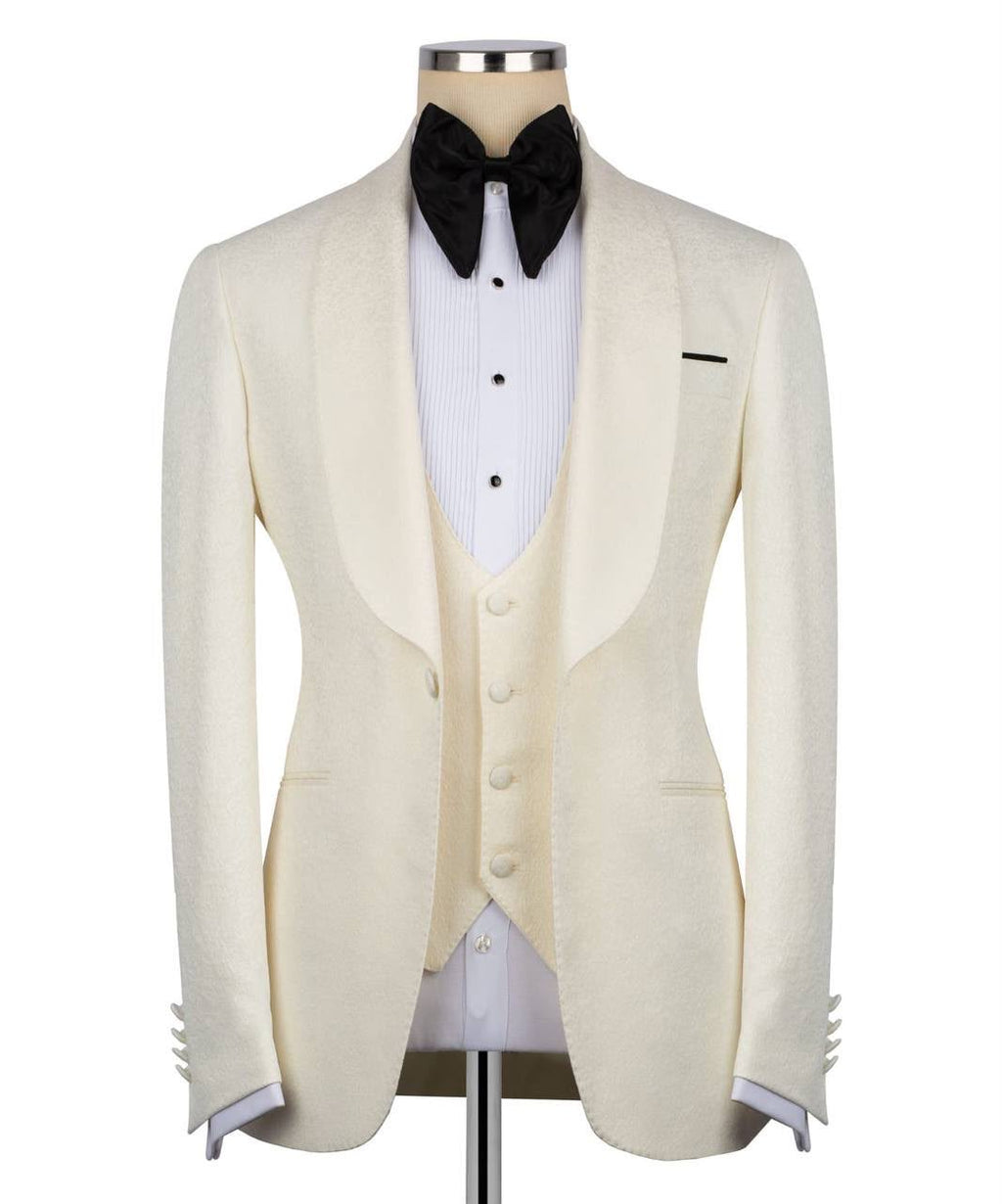 White tuxedo jacket with black bow tie on a mannequin 