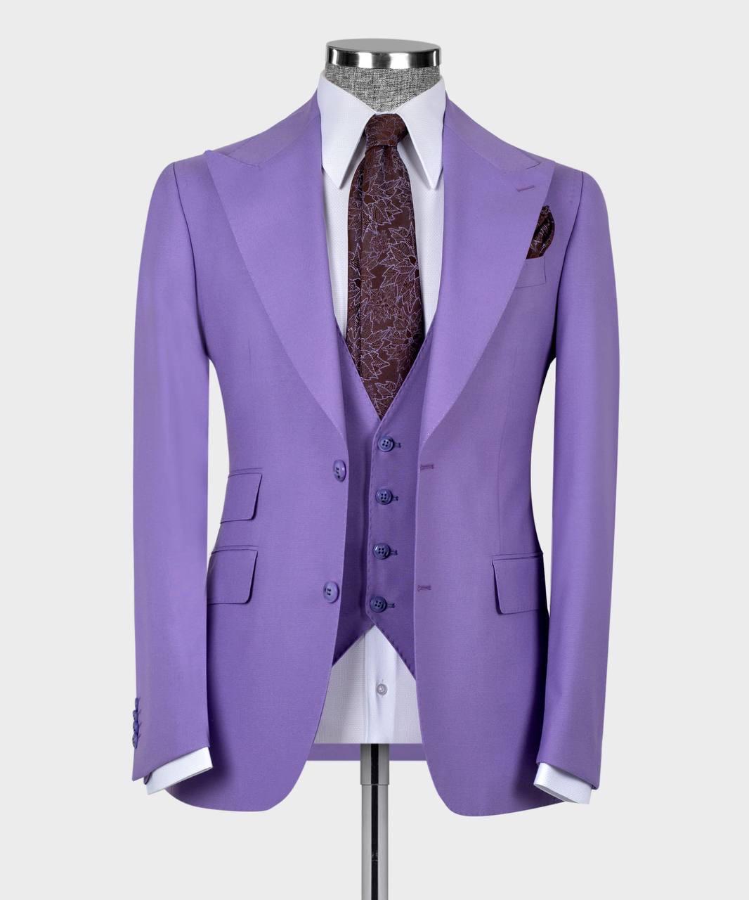 Purple suit with vest and tie on a mannequin against a white background