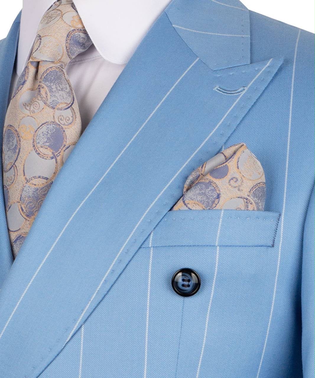 Light blue pinstripe suit with patterned tie and pocket square on a white background