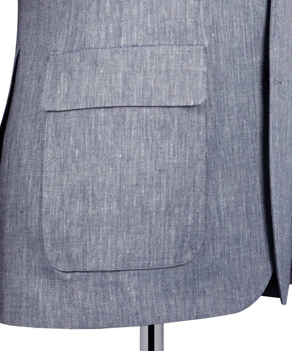 Close-up of a gray suit jacket with a pocket on a white background