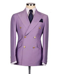 A lavender purple double-breasted suit jacket displayed on a mannequin torso, styled with a white dress shirt, a navy patterned tie, and a matching pocket square 