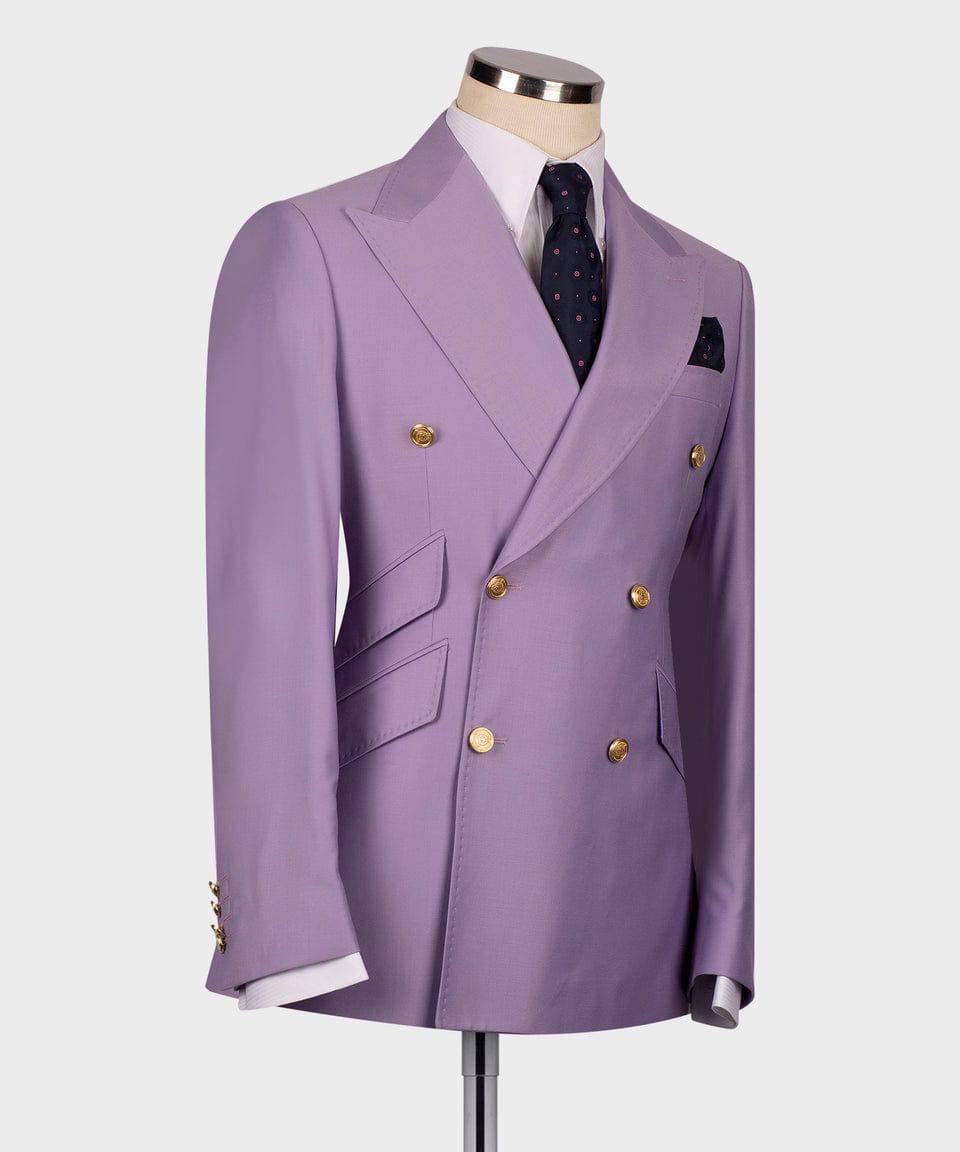 A lavender double-breasted suit jacket displayed on a mannequin torso, featuring gold buttons, a white shirt, a dark patterned tie, and a matching pocket square 