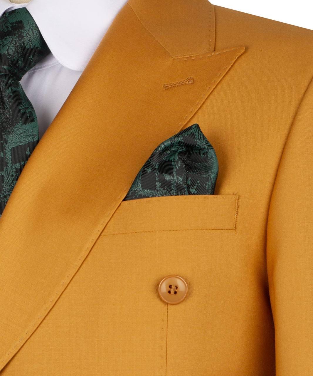 Close-up of a mustard yellow suit jacket with a patterned pocket square and tie.
