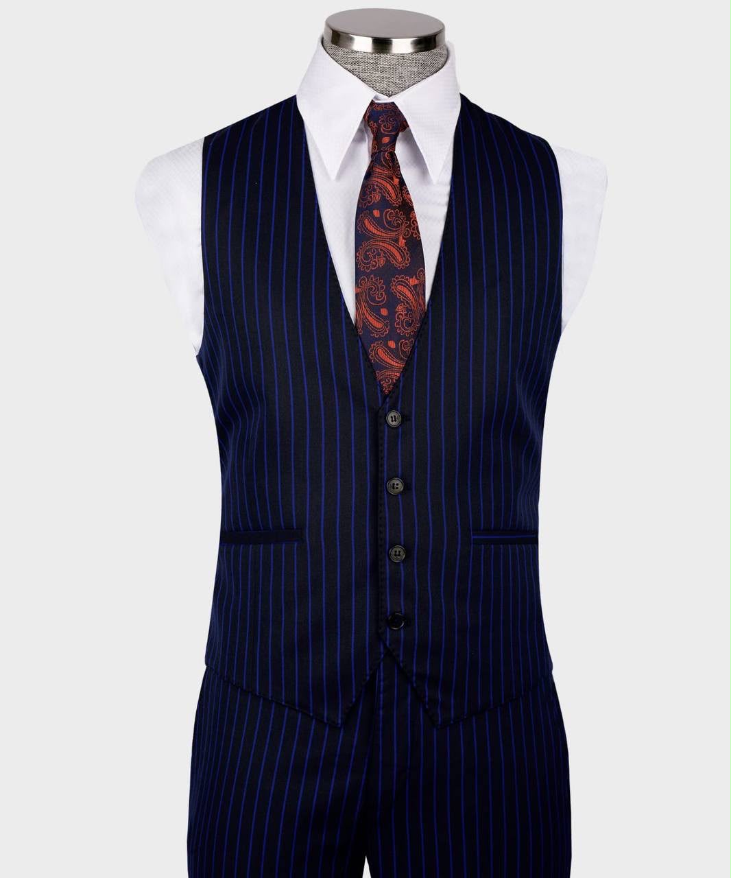 Navy pinstripe vest with a white shirt and patterned tie on a mannequin