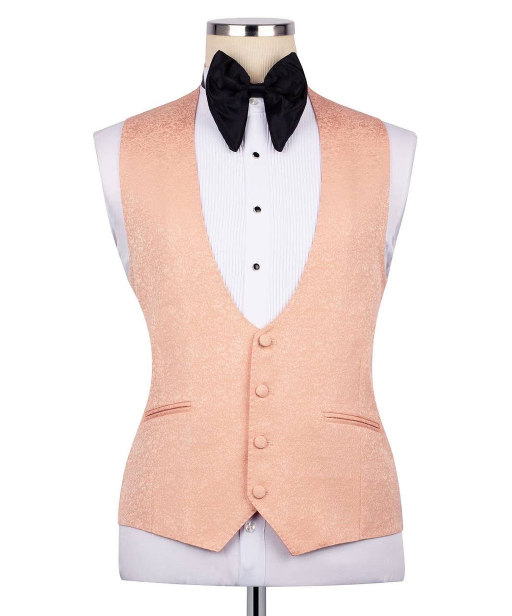 Peach vest with a black bow tie on a mannequin against a white background