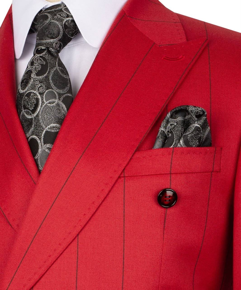 Red suit jacket with a patterned tie and pocket square
