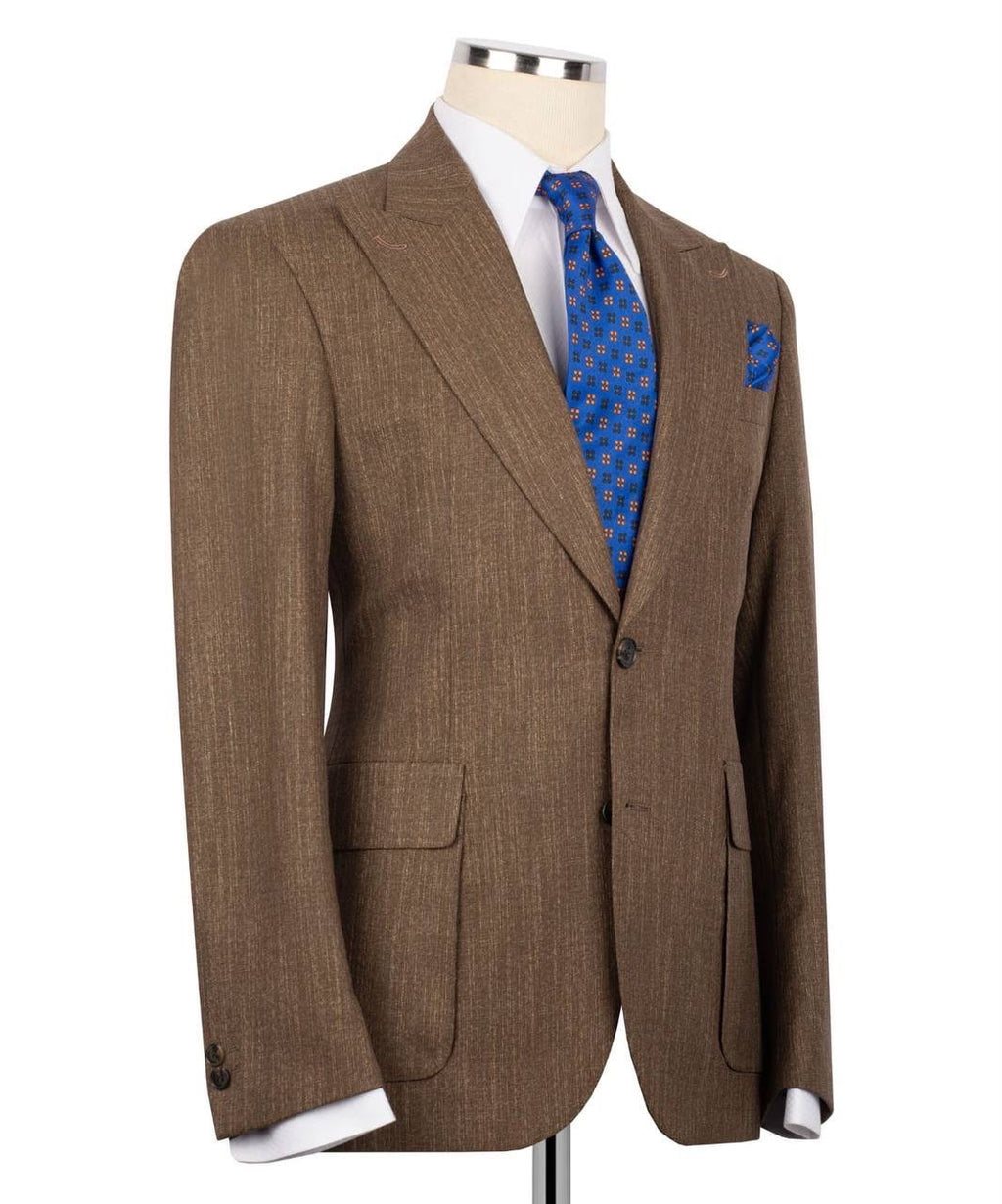 A brown textured suit jacket displayed on a mannequin torso, styled with a white dress shirt, a blue patterned tie, and a matching blue pocket square against a plain white background.
