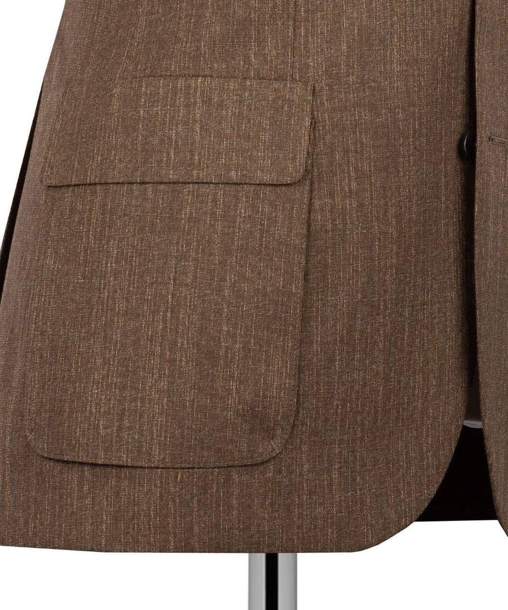 Close-up of a brown textured suit jacket showing a front flap pocket and part of the lapel on a white background.