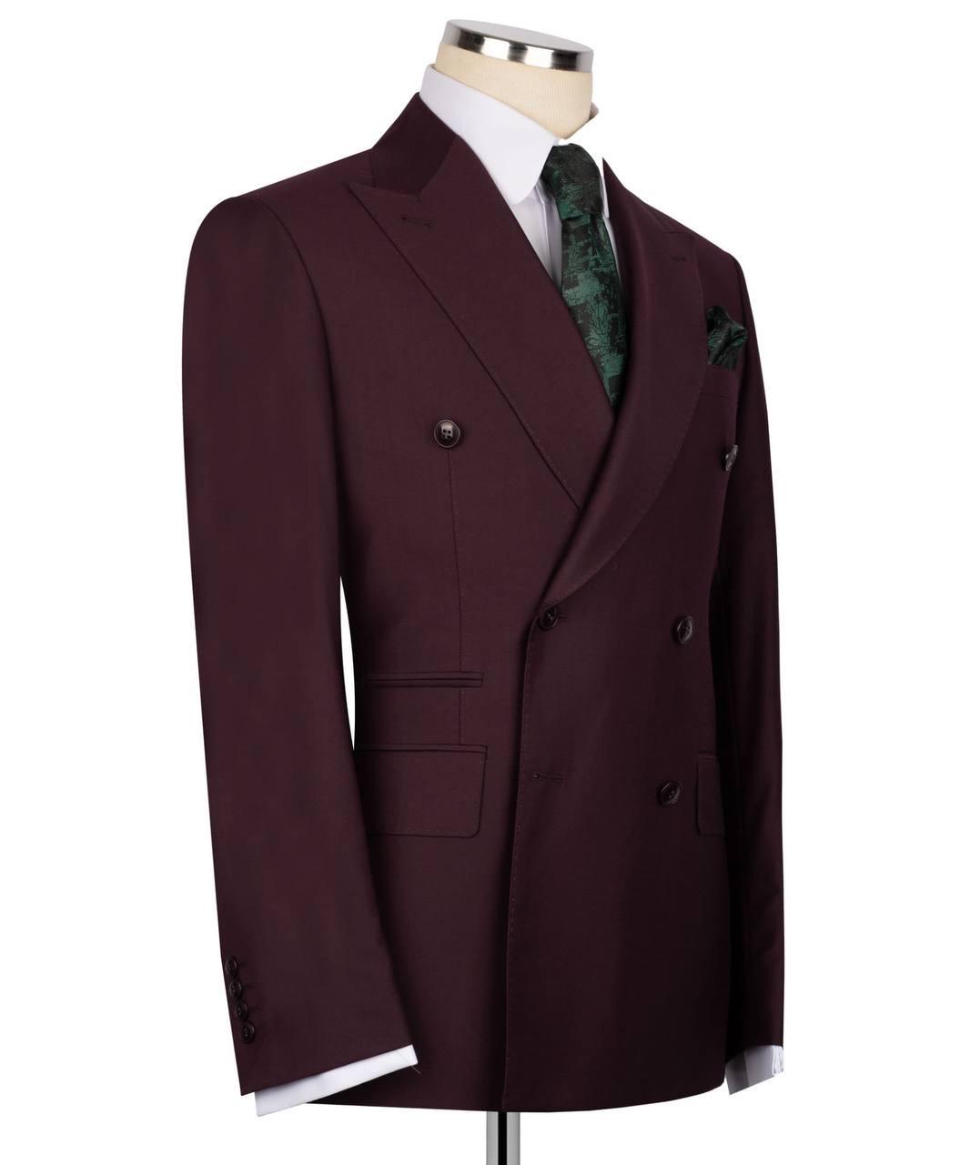 Maroon double-breasted suit jacket on a mannequin with a white background