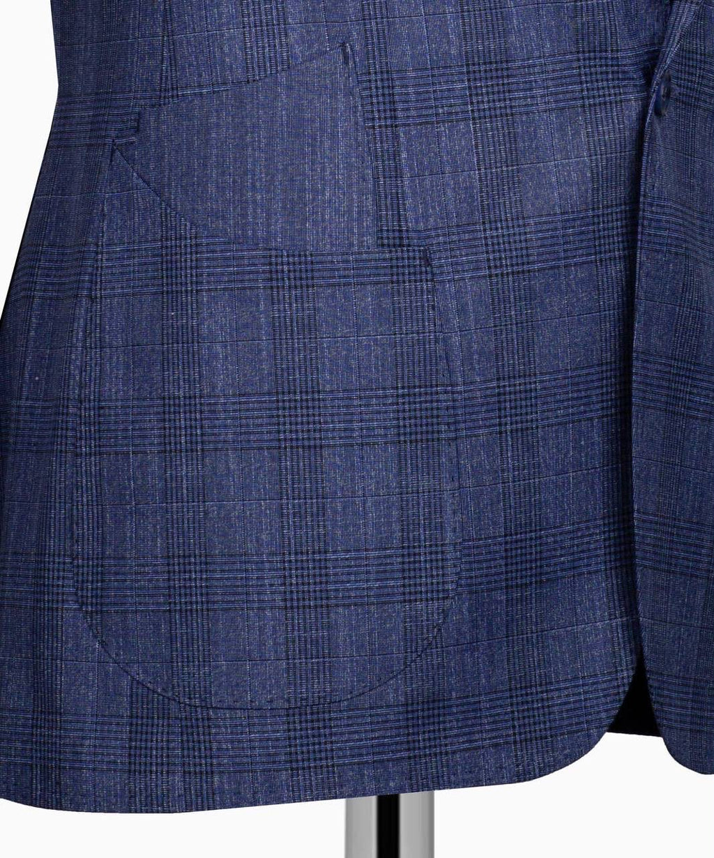 Close-up of a blue checkered suit jacket on a mannequin.